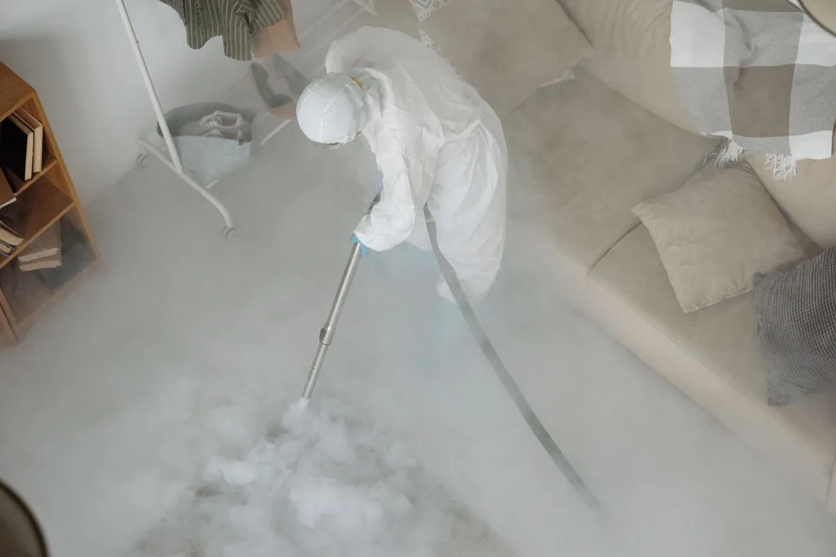 Biohazard cleanup technician in protective equipment, Baldwinville, MA